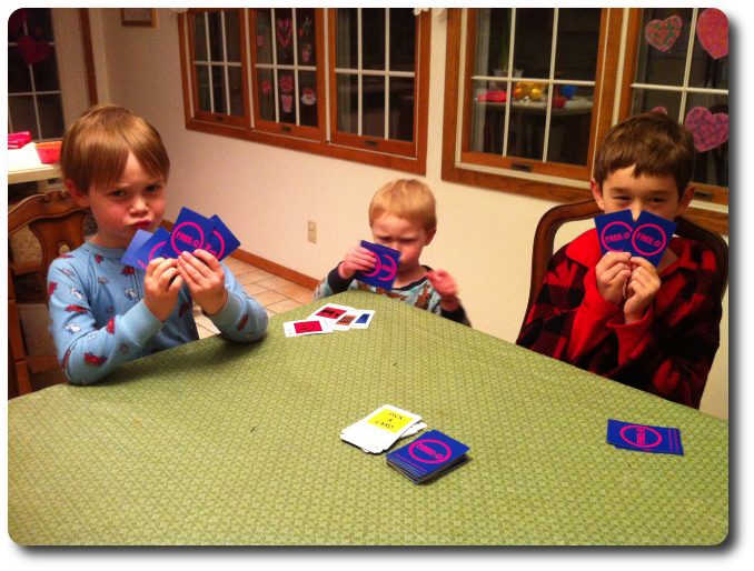 My little geeks stealthily hide behind their cards, ready to pounce!